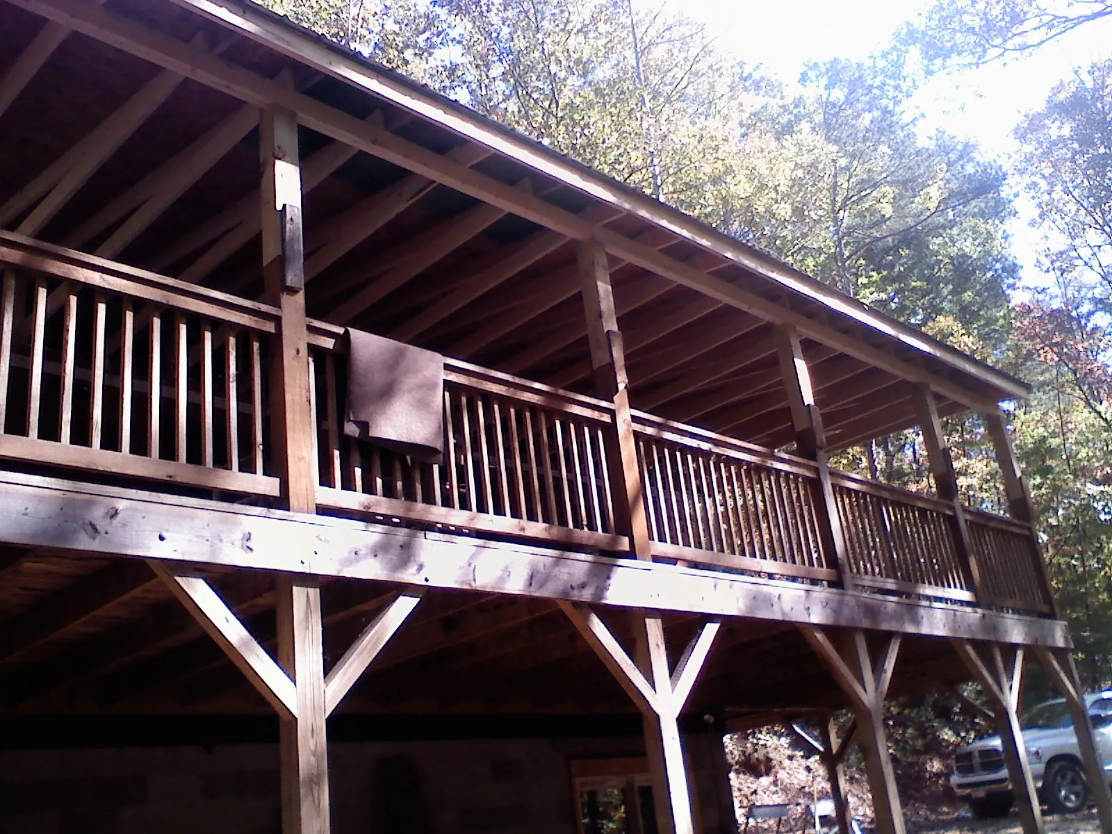 Timber framing under a new elevated porch and deck — Roof Leak Repair in Osterville by Roofing Brothers